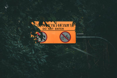 Close-up of information sign on field