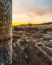 High angle view of city buildings during sunset