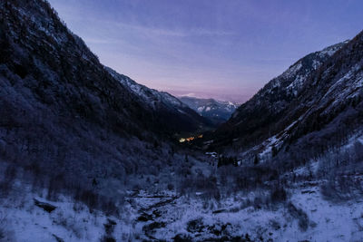 Scenic view of mountains against sky during winter