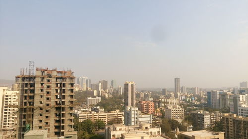 Scenic view of cityscape against sky