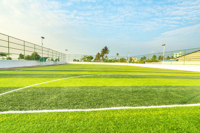 Soccer field against sky