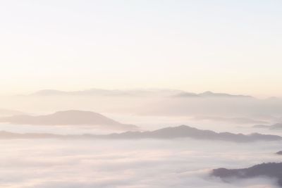 Scenic view of mountains against sky during sunset