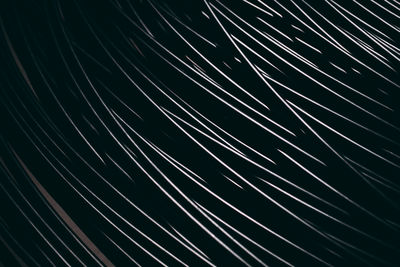 Low angle view of spider web against sky