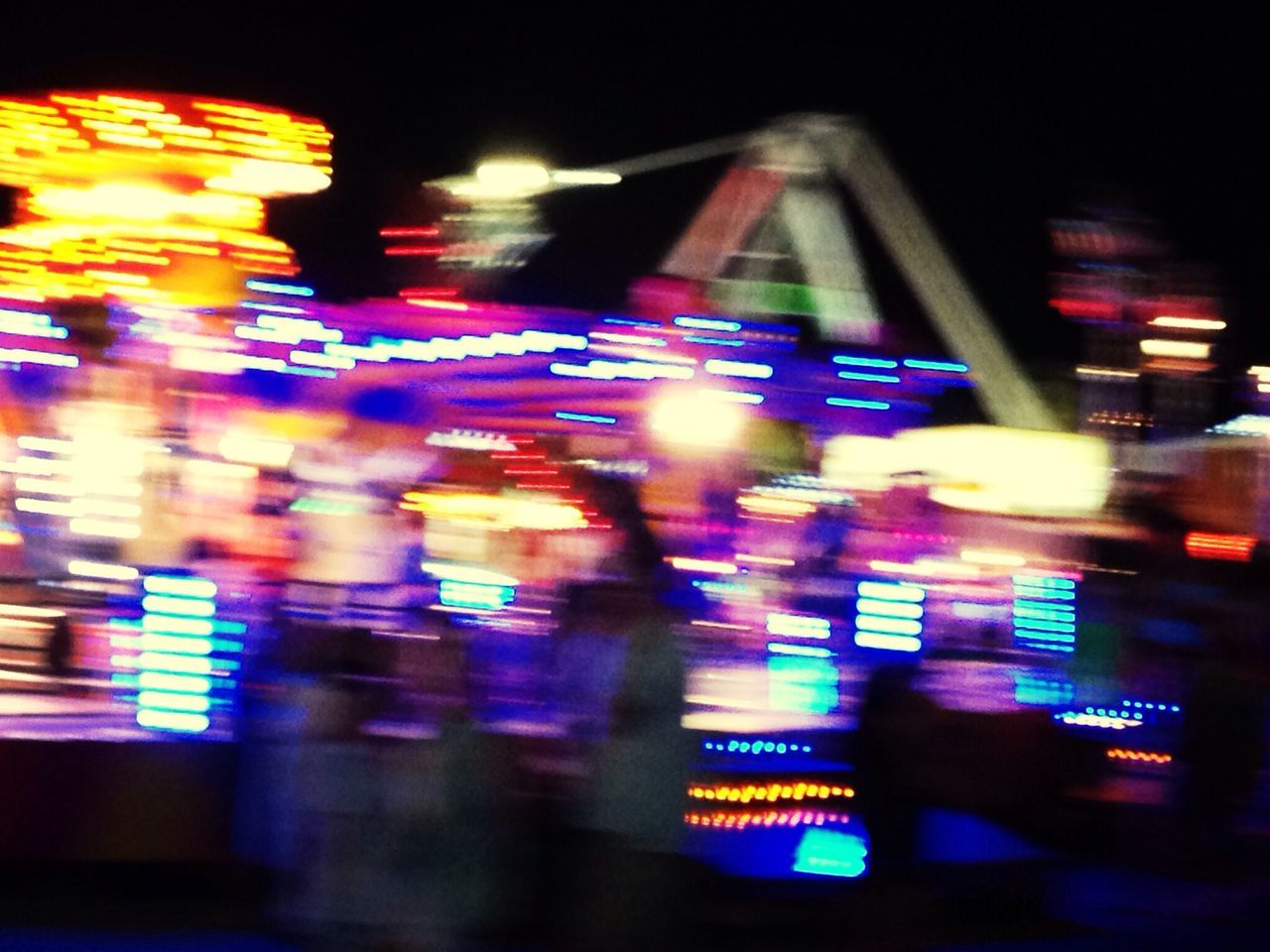 illuminated, night, transportation, blurred motion, city, lighting equipment, city life, speed, motion, defocused, long exposure, street, light - natural phenomenon, built structure, architecture, light trail, text, building exterior, neon, road