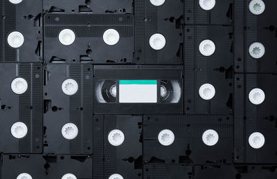 Full frame shot of black audio cassettes