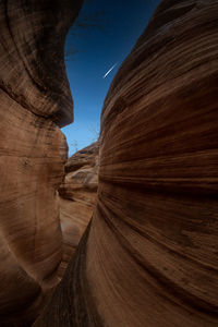 Scenic view of rock formations against sky