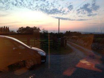 Empty road at sunset