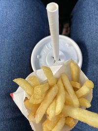 High angle view of burger and fries on table