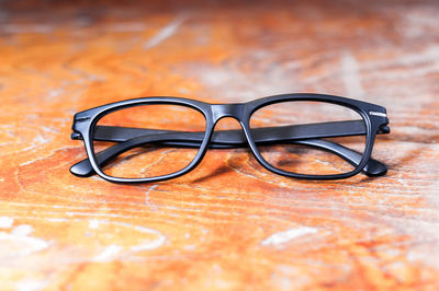 Close-up of eyeglasses on table