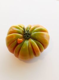 Close-up of fruits against white background