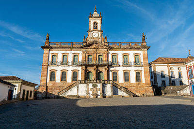 View of historical building against blue sky