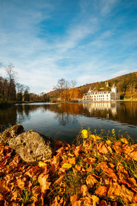 Scenic view of lake against sky during autumn