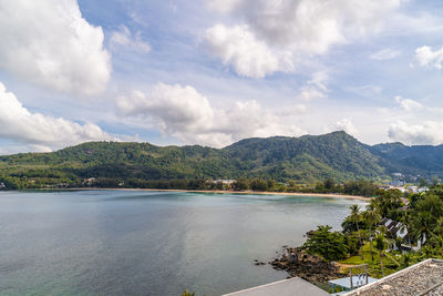 View of the beautiful andaman sea with fluffy wihte clouds in phuket, thailand