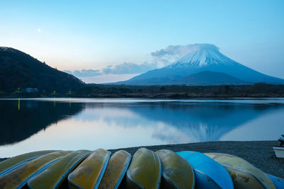 Mount fuji. view at lake shoji in the morning with row of boats. fuji five lake, yamanashi, japan.