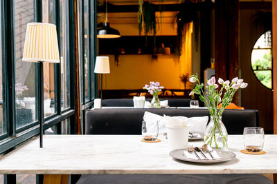 View of potted plants on table in restaurant