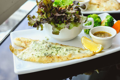 Close-up of food served on table
