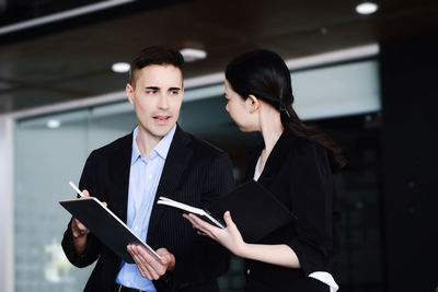 Portrait of businesswoman using digital tablet