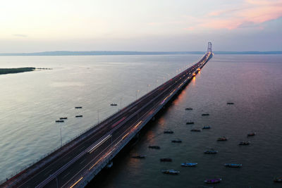 High angle view of sea against sky during sunset