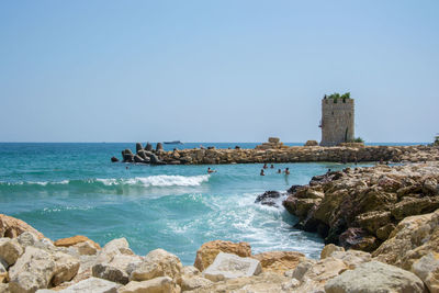 Scenic view of sea against clear sky