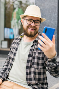 Young woman using mobile phone