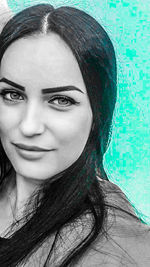 Close-up portrait of a smiling young woman