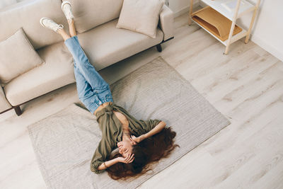 Low section of woman standing on floor