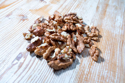 Close-up of roasted coffee beans on table