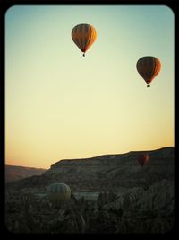 Hot air balloons in sky