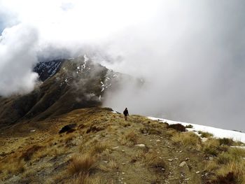 Scenic view of mountains against sky during winter