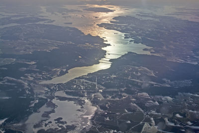 High angle view of sea and land