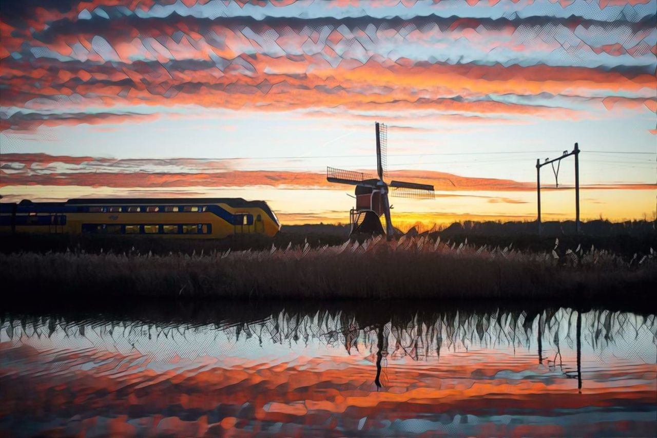 sunset, transportation, sky, orange color, mode of transportation, nature, beauty in nature, land vehicle, scenics - nature, cloud - sky, no people, road, field, landscape, plant, outdoors, tranquil scene, land, environment, tranquility