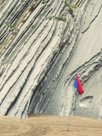 Scenic view of flag on beach