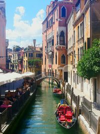 Boats moored in canal