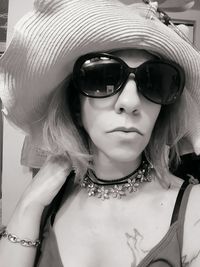 Portrait of young woman wearing sunglasses