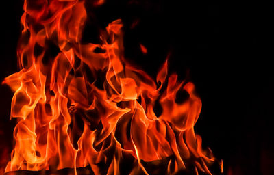 Close-up of bonfire on black background