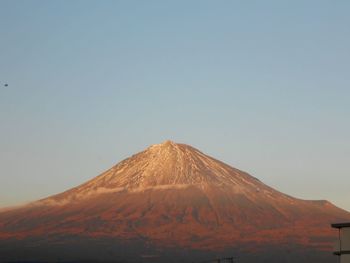 View of volcanic mountain against sky