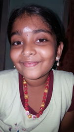 Close-up portrait of smiling woman