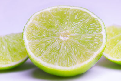Close-up of lemon slice on table