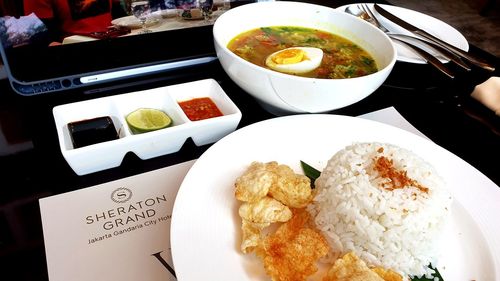 High angle view of meal served on table