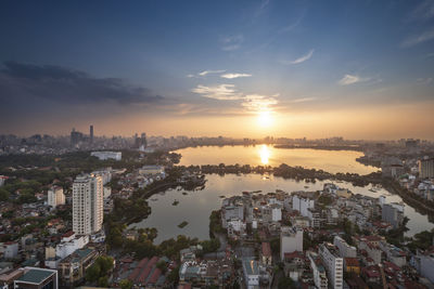 High angle view of buildings against sky during sunset