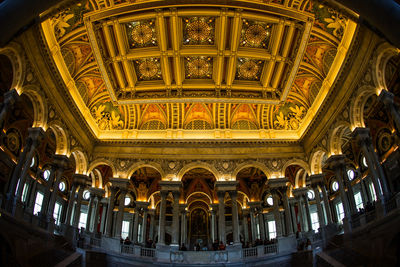 Low angle view of illuminated ceiling in building