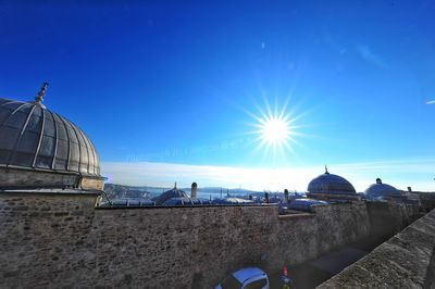 Panoramic view of temple against blue sky