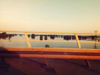 Car on road at sunset