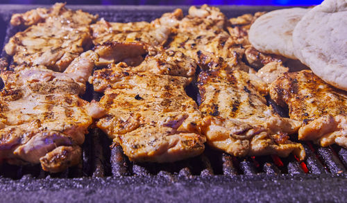 Close-up of meat on barbecue grill