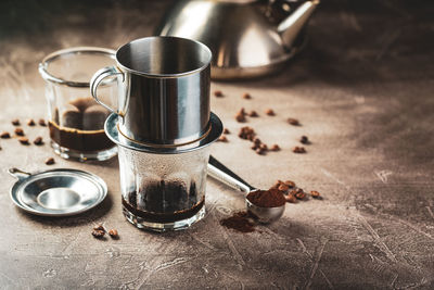 Close-up of coffee cup on table