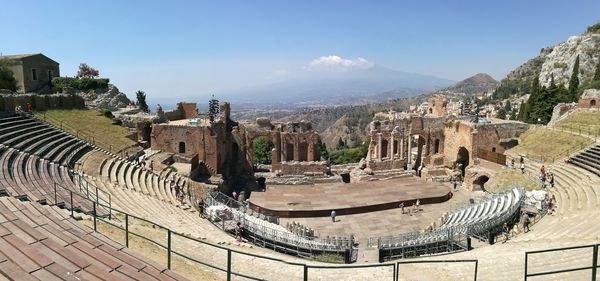 Ancient theatre of taormina against sky in city