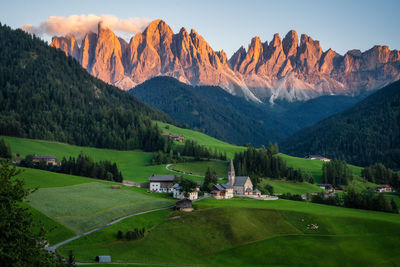 Scenic view of landscape and mountains against sky