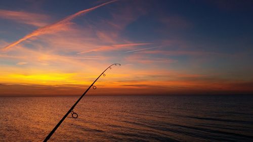 View of calm sea at sunset