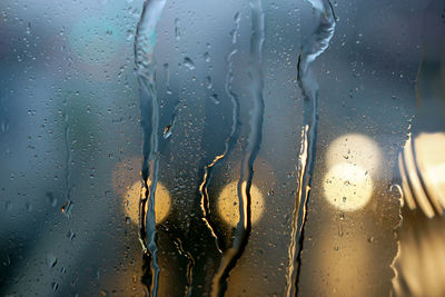 Full frame shot of wet glass window