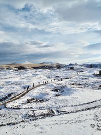 Scenic view of sea against sky during winter